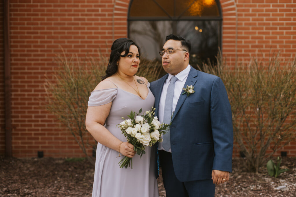 Isishaj and her brother at his wedding. The wedding reception building is behind. That night he had a seizure. The next morning I had a seizure. The life of having epilepsy. 